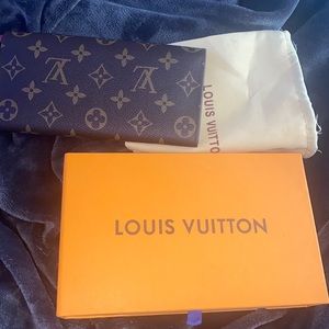 Women’s Louis Vuitton emilie wallet